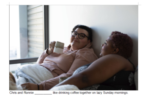 Two women drinking tea in bed